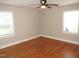 Bright room featuring hardwood floors and natural light, ready for personalization and new memories at 734 Baker St, Oxford, NC 27565