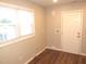 Well-lit room showcasing hardwood floors and natural light, providing a versatile and inviting space at 734 Baker St, Oxford, NC 27565