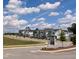 Allen Park community featuring colorful homes and beautiful landscaping under a partially cloudy sky at 942 Allen Park Dr, Knightdale, NC 27604
