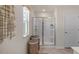 Bright bathroom featuring a shower and updated fixtures at 110 Ethel Ln, Angier, NC 27501