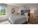 Bright bedroom featuring a comfortable bed and ample natural light at 110 Ethel Ln, Angier, NC 27501