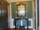 Inviting entryway with a decorative mirror and console table at 13 E Milan Ct, Clayton, NC 27527