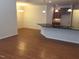 Open concept kitchen and dining area with hardwood floors at 13 E Milan Ct, Clayton, NC 27527