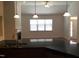 Kitchen with breakfast bar overlooking living room at 13 E Milan Ct, Clayton, NC 27527
