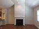 Fireplace and hardwood floors in living room at 13 E Milan Ct, Clayton, NC 27527