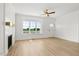 Bright living room with hardwood floors and fireplace at 1467 Antioch Church Rd # 2-A, Timberlake, NC 27583