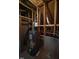 Unfinished attic with water heater and exposed framing at 2004 Clyde Bank Ct, Cary, NC 27511