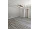 Spacious basement bedroom with wood-look flooring at 2004 Clyde Bank Ct, Cary, NC 27511