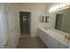 Bathroom with double vanity and shower at 2004 Clyde Bank Ct, Cary, NC 27511