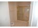 Bathroom with shower and tile flooring at 2004 Clyde Bank Ct, Cary, NC 27511