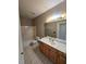 Clean bathroom with a vanity, toilet, and bathtub at 2004 Clyde Bank Ct, Cary, NC 27511