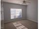 Bright bedroom with carpet and large window at 2004 Clyde Bank Ct, Cary, NC 27511