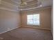 Spacious bedroom with carpet and ceiling fan at 2004 Clyde Bank Ct, Cary, NC 27511