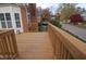Wooden deck with railing offering street views at 2004 Clyde Bank Ct, Cary, NC 27511