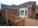 Elevated deck with wooden railing overlooking backyard at 2004 Clyde Bank Ct, Cary, NC 27511