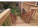 Back deck with wooden stairs leading down to the yard at 2004 Clyde Bank Ct, Cary, NC 27511