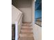 Wooden stairs leading to upper garage storage at 2004 Clyde Bank Ct, Cary, NC 27511