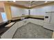 Kitchen with white cabinets and dark countertops at 2004 Clyde Bank Ct, Cary, NC 27511