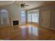 Bright living room with hardwood floors and fireplace at 2004 Clyde Bank Ct, Cary, NC 27511