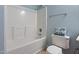 Close up of bathroom shower/tub with towels on top of toilet at 2621 Oldgate Dr # 105, Raleigh, NC 27604