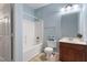 Cozy bathroom featuring a shower-tub combo and wooden vanity at 2621 Oldgate Dr # 105, Raleigh, NC 27604