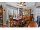 Bright dining area with a wood table and six chairs at 316 Trappers Run Dr, Cary, NC 27513