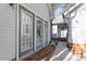 Home features gray siding, brick accents, and a walkway at 316 Trappers Run Dr, Cary, NC 27513
