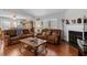 Living room features hardwood floors and a cozy fireplace at 316 Trappers Run Dr, Cary, NC 27513