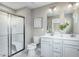 Modern bathroom with double vanity, large shower, and toilet at 38 Brazan Ct, Fuquay Varina, NC 27526