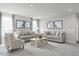 Spacious living room with comfortable seating and large windows at 38 Brazan Ct, Fuquay Varina, NC 27526