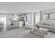 Open concept living room with kitchen and dining room views at 38 Brazan Ct, Fuquay Varina, NC 27526