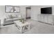 Cozy living room with sofa, coffee table, and media cabinet at 38 Brazan Ct, Fuquay Varina, NC 27526