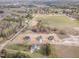 Aerial view of a new home community with multiple homes and surrounding greenery at 57 Nottoway Ln, Wendell, NC 27591