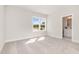 Bedroom with a window view of the outdoors and an ensuite bathroom at 57 Nottoway Ln, Wendell, NC 27591