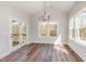 Dining area featuring natural light from the windows and access to the outdoor deck at 57 Nottoway Ln, Wendell, NC 27591