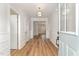 Inviting foyer with hardwood floors and views into the living room at 57 Nottoway Ln, Wendell, NC 27591