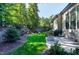 Private backyard patio with seating and grill area at 5904 Bellona Ln, Raleigh, NC 27612