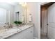 Bathroom boasts double vanity with granite countertop at 5904 Bellona Ln, Raleigh, NC 27612
