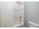 Clean bathroom with white tiled shower/tub combo at 5904 Bellona Ln, Raleigh, NC 27612