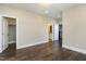 Spacious bedroom with hardwood floors and ample closet space at 5904 Bellona Ln, Raleigh, NC 27612
