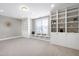 Bright bonus room with built-in shelving and window seat at 5904 Bellona Ln, Raleigh, NC 27612