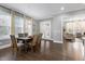 Spacious dining area with hardwood floors and view to living room at 5904 Bellona Ln, Raleigh, NC 27612