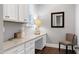 Home office with built-in desk and ample storage at 5904 Bellona Ln, Raleigh, NC 27612