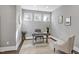 Bright home office with built-in desk and seating at 5904 Bellona Ln, Raleigh, NC 27612