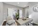 Spacious home office with built-in desk and seating area at 5904 Bellona Ln, Raleigh, NC 27612