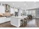 Spacious kitchen with island, stainless steel appliances, and breakfast area at 5904 Bellona Ln, Raleigh, NC 27612
