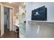 Luxury walk-in closet with vanity and abundant storage at 5904 Bellona Ln, Raleigh, NC 27612
