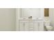 Modern bathroom with double vanity and white cabinets at 605 Morning Light Dr, Angier, NC 27501