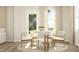 Bright dining area with a round table and four white chairs at 605 Morning Light Dr, Angier, NC 27501