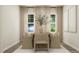 Bright dining room with a wooden table and six beige chairs at 605 Morning Light Dr, Angier, NC 27501